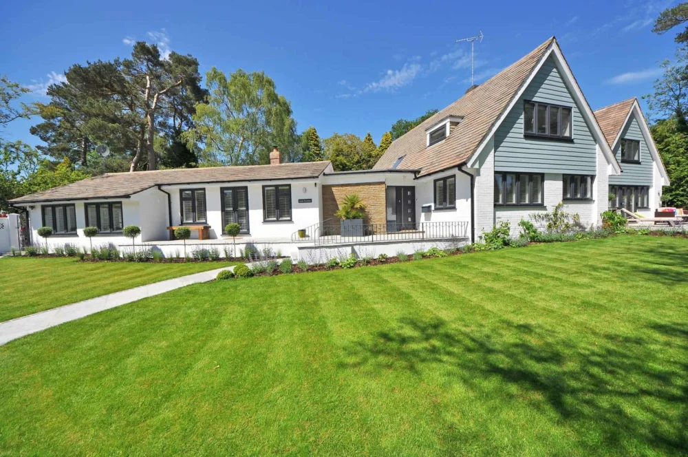 Well-kept garden and green lawn beside a home
